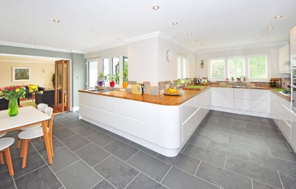 Tiled-Kitchen-area-in-white-kitchen-open-plan-