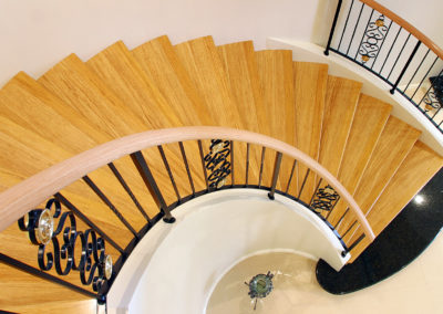 spiral staircase timber flooring with wood balustrade