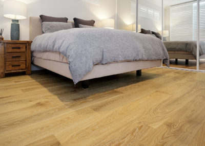 natural wooden floorboards in bedroom
