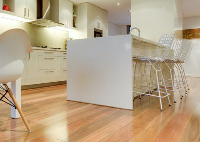 Spotted Gum engineered timber flooring in kitchen and dining area of Perth home