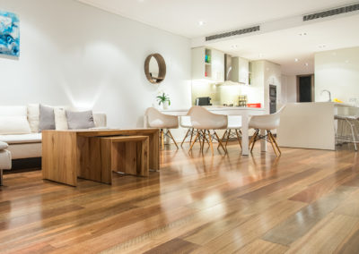 Open plan living and kitchen area with Australian hardwood timber Spotted Gum flooring