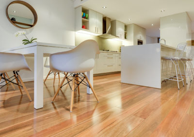 Spotted gum floorboard used in apartment kitchen