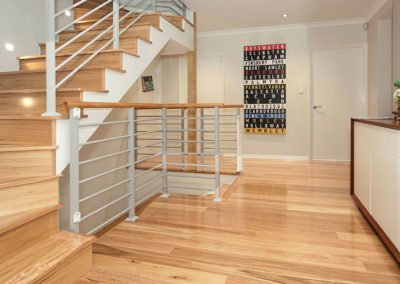 Blackbutt timber flooring in house with stairs