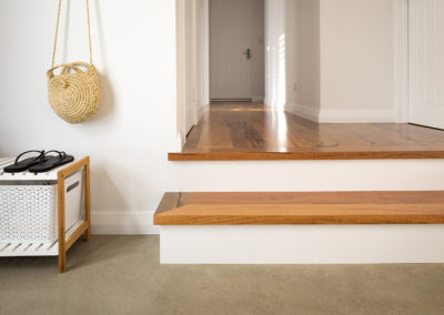 Marri timber flooring through passage with a step down