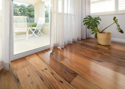 Marri timber flooing in living area connecting to balcony