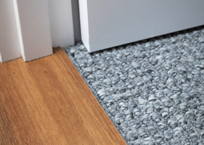 Marri floor in doorway meeting up with carpet