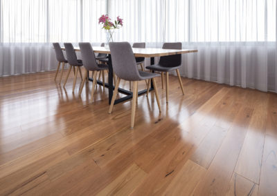 Dining are with big windows and blackbutt engineered timber flooing