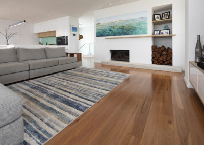 Open plan lounge area with Blackbutt timber floorboards