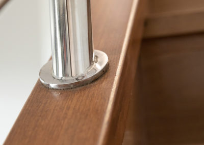 close up shot of balustrade on timber staircase rails