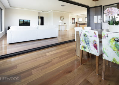 Living and dinning area of recently renovated home in Perth with timber flooring from Lifewood