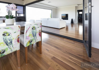Blackbutt timber flooring with white skirting and matching beading