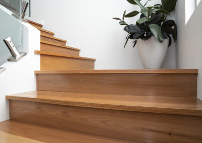 Blackbutt staircase between wall and stringer