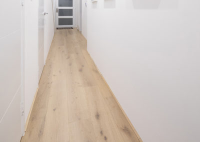 passageway with French oak timber flooring limed wash