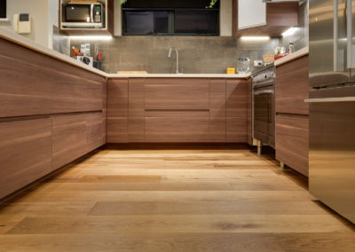 Smoked oak floorboards in kitchen area
