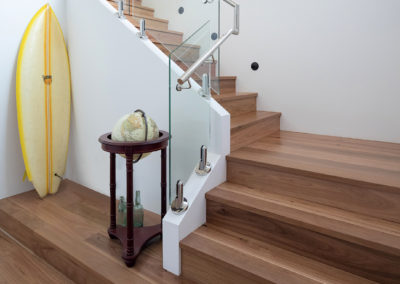 Elongated bottom step of staircase using Blackbutt timber flooring in Perth