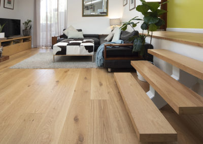 French Oak open tread step to sunken living area