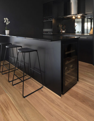 Blackbutt Timber Flooring Perth in black kitchen