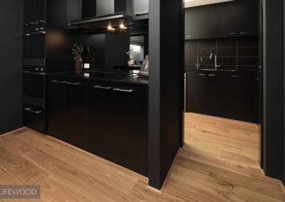 Blackbutt timber flooring Perth in black kitchen