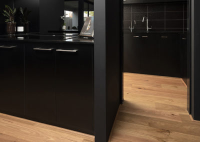 Blackbutt timber flooring Perth in black kitchen