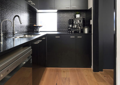 Blackbutt timber flooring Perth in black kitchen