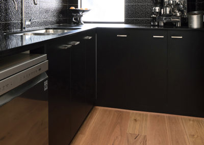 Blackbutt timber flooring Perth in black kitchen